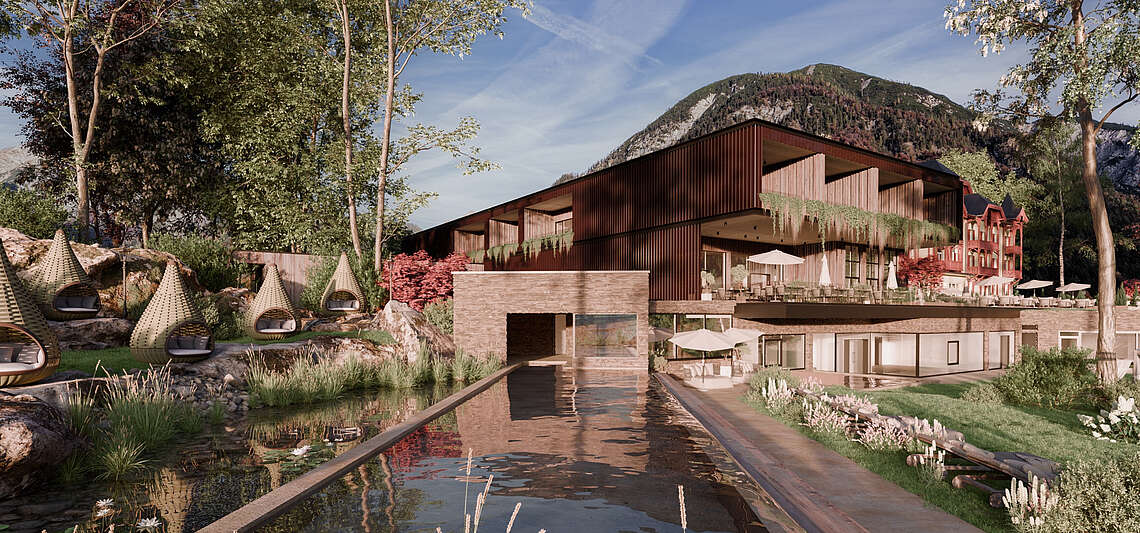 Panorama Pool und Wellnessgarten im Mazaggs – Alpenhof am Achensee mit Blick auf den Pavillon und die Terrasse des Restaurants Siegfrieds beim See
