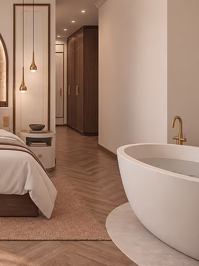 Eines von zwei Schlafzimmern der Superior Suite im Art-Déco-Stil mit Doppelbett und eigener freistehender Badewanne
