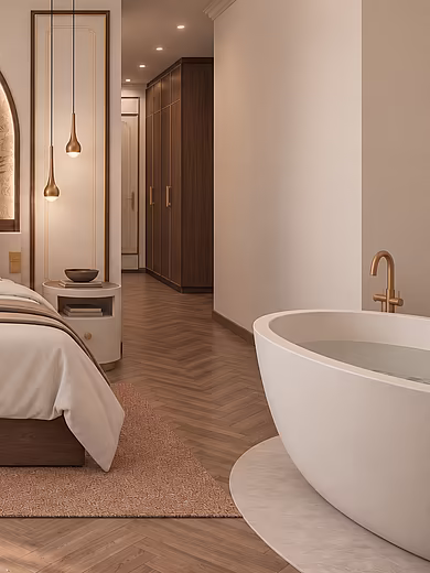 Eines von zwei Schlafzimmern der Superior Suite im Art-Déco-Stil mit Doppelbett und eigener freistehender Badewanne